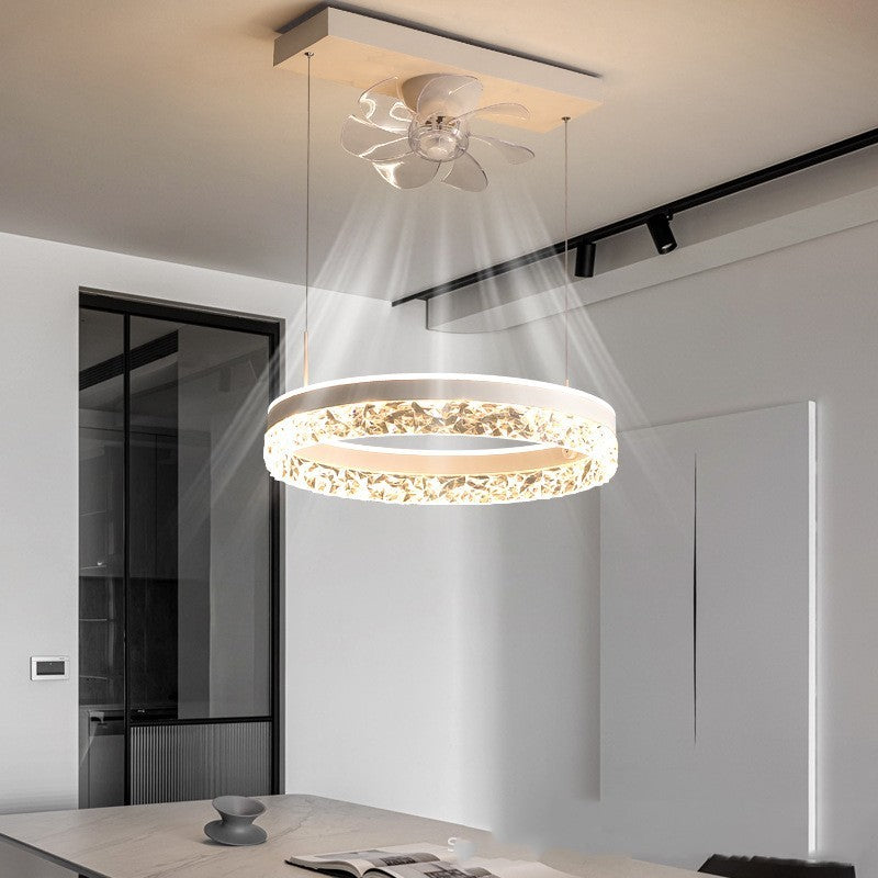 Modern Scandinavian luxury ceiling fan light with acrylic shade in minimalist dining room setting.